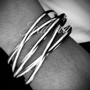 Interlocked Silver Bangle Bracelet crossover rhodium dipped .